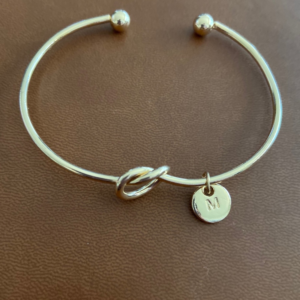 Knotted “M” bracelet